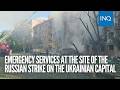 Emergency services at the site of the Russian strike on the Ukrainian capital