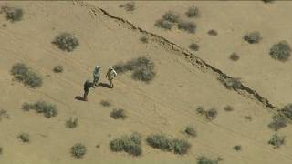 Raw video from ktla's sky5 shows a fissure running along the mojave
desert floor on morning of july 6, 2019, day after magnitude 7.1
earthquake struc...