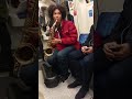 Pro Sax Player has a quick jam with a street artist in the tube in London.