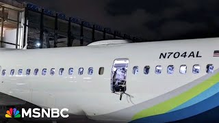 See plane passengers watch as door blows off mid-air