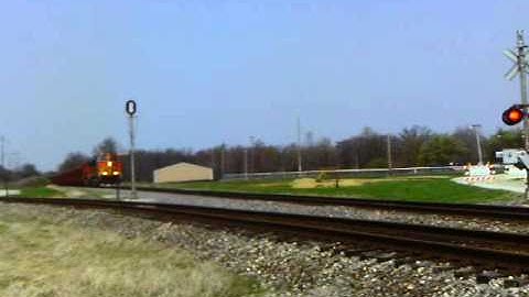 2 BNSF dash 9 leading new hoppers!!