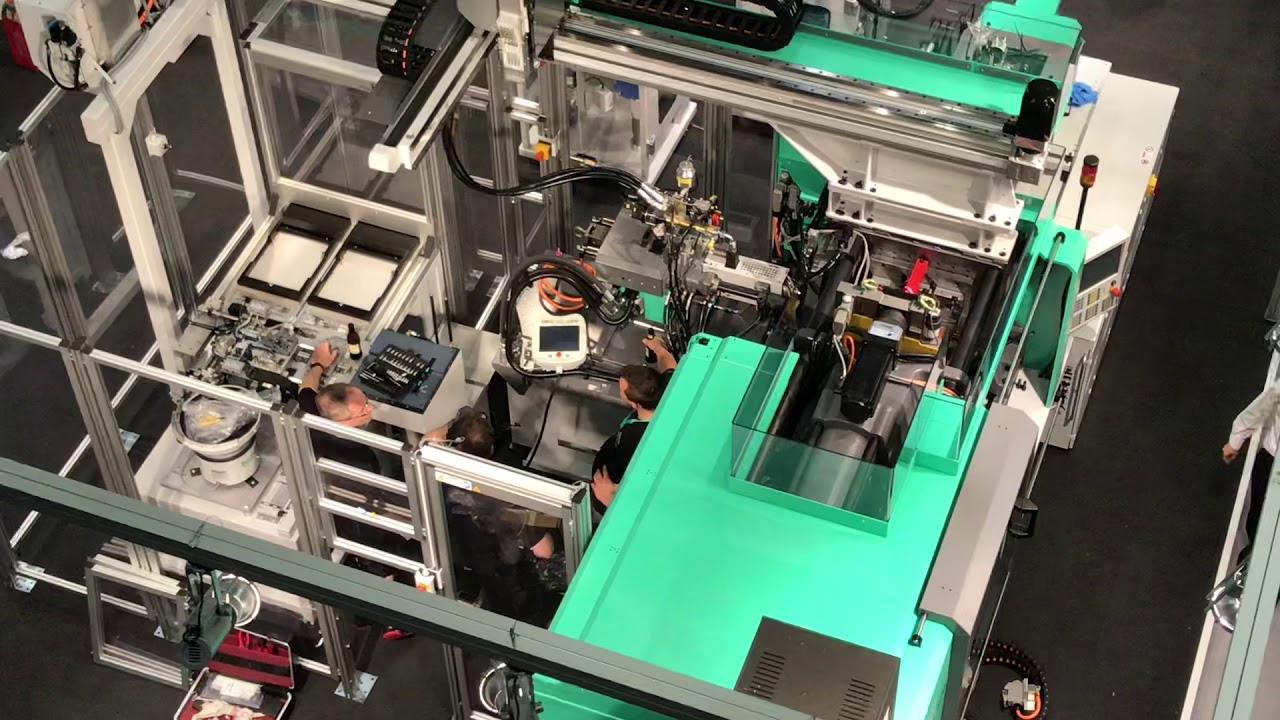 Arburg injection machine accident on exhibition, beer spilled