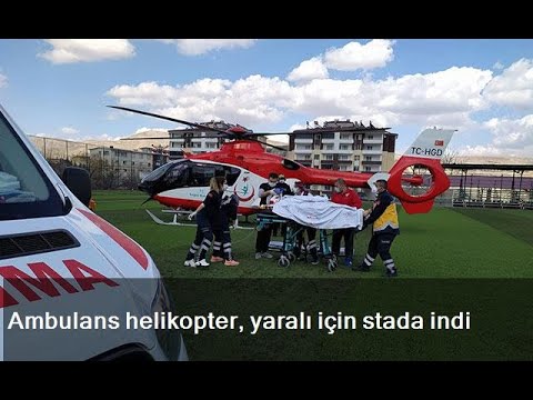 Ambulans helikopter, yaralı için stada indiAmbulans helikopter yarali icin stada indi