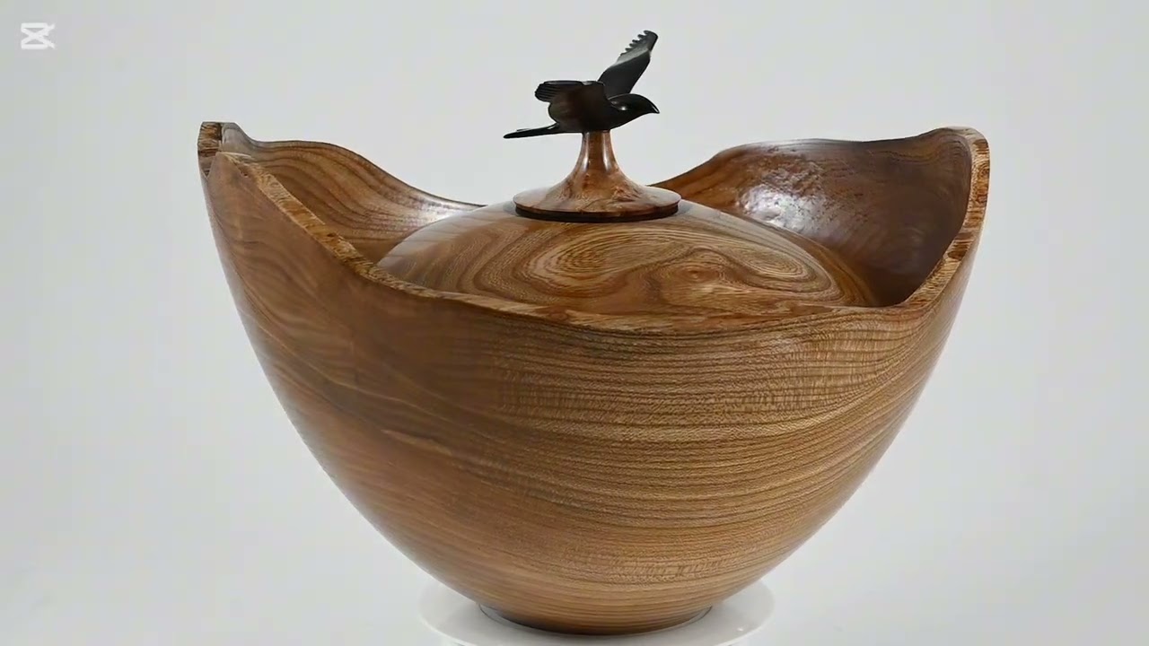 Large handmade wooden urn of Dutch Elm with a bird