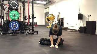 Lateral Crawl with Sandbag Pull Through