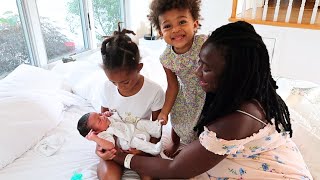The girls meet their baby brother for the first time