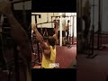 Arnold Schwarzenegger doing behind-the-neck lat pull downs while filming Pumping Iron in 1975