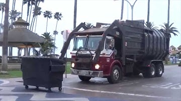 White Xpeditor Amrep Front Load Garbage Truck