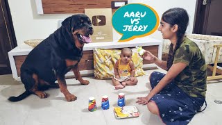 Dog and baby playing a game.|| aaru vs jerry who will win?