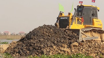 Matador Wheel Loader And SHANTUI Bulldozer Spreading Rock Soil And SHACMAN Dump Truck Unloading Soil