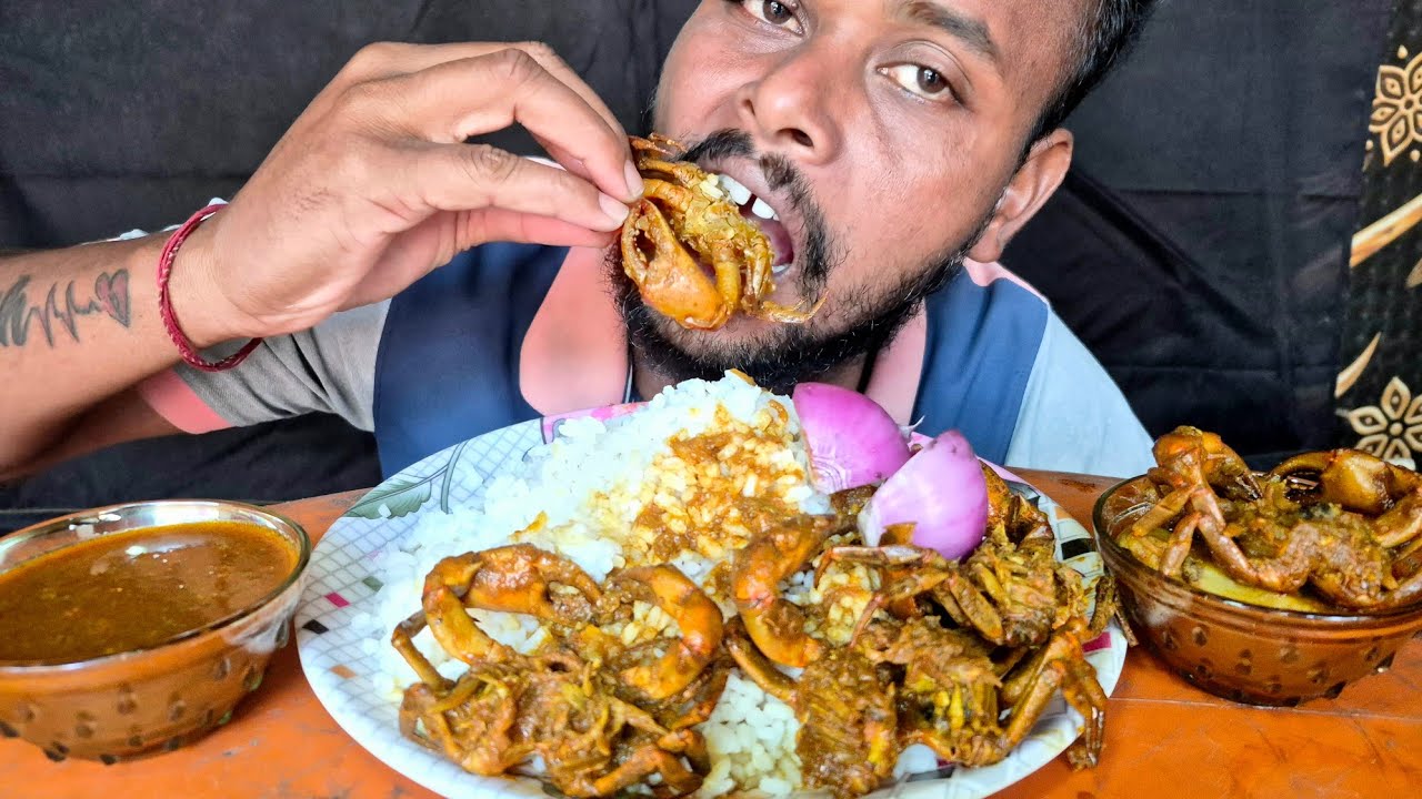 Eating Spicy  Crab Curry With Rice 