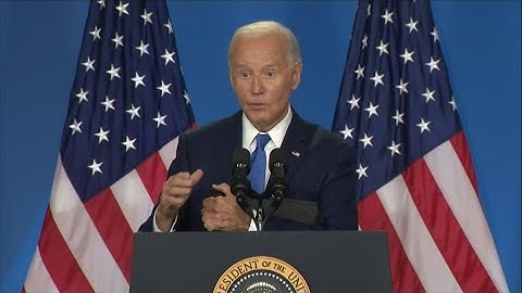 Joe Biden whispers answer about polls toward the end of press conference