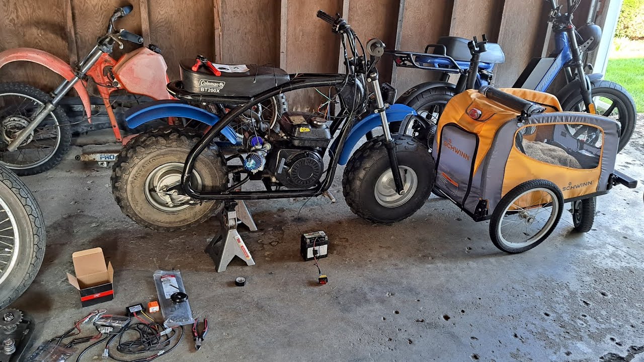 Wiring a headlight, tailight, brake light switch, and turn signals onto a mini bike with battery.
