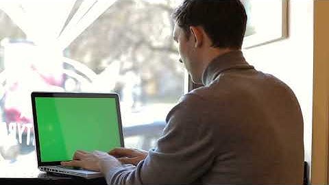 Businessman Working At Laptop Computer in Cafe Green Screen For Your Custom Screen Free HD Videos