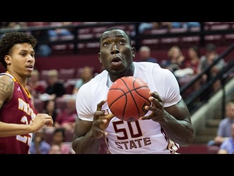 football score Second Half Surge Fuels 75-67 Win