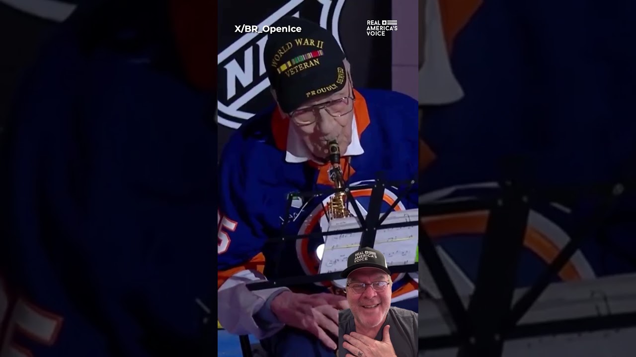 105-year-old WWII vet plays the anthem