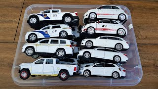 Box full of Cars:  Various White cars from different brands