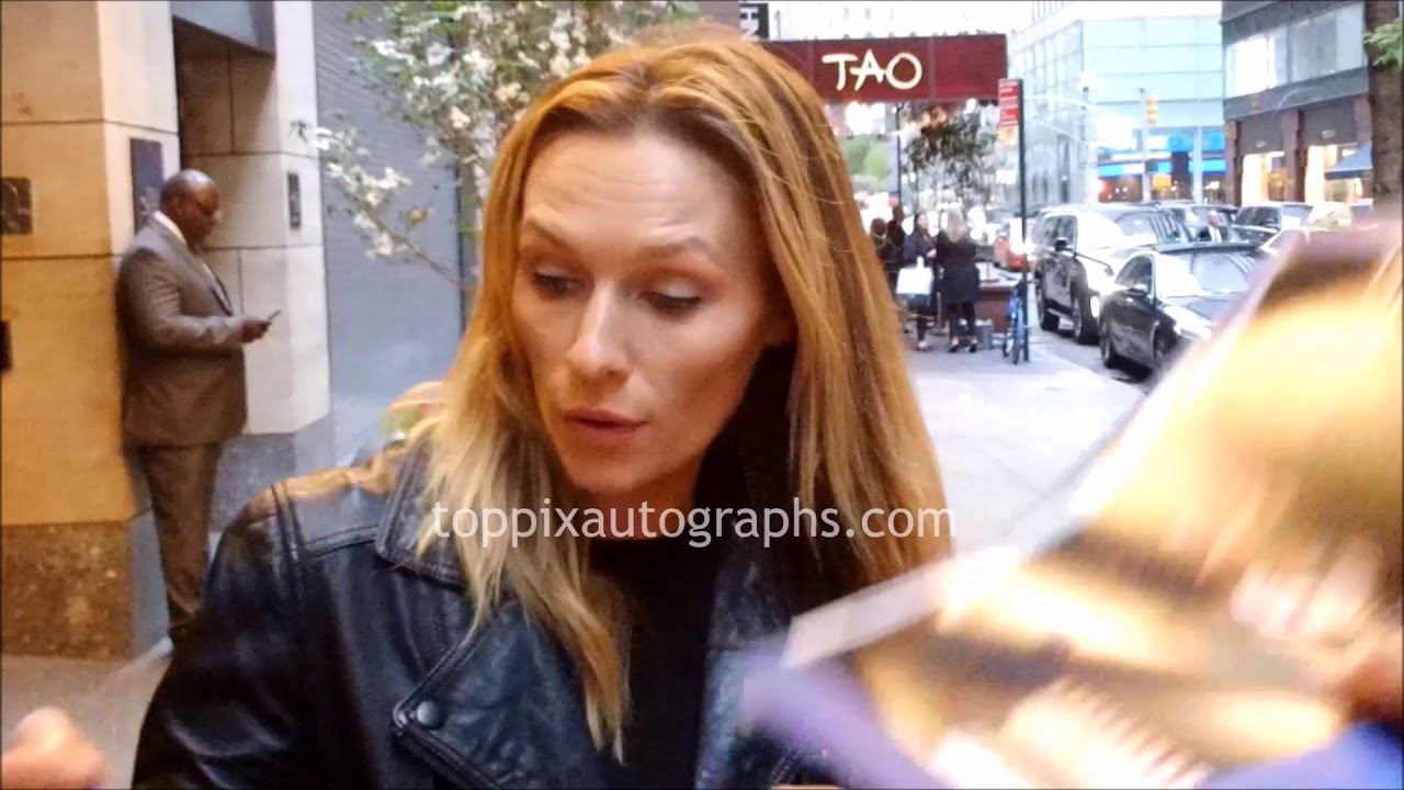 Michaela McManus signs autographs for TopPix