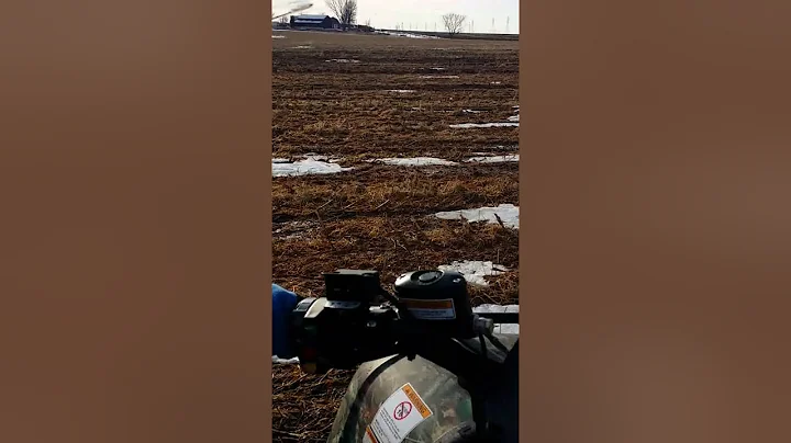 Zachary Curran riding a four wheeler