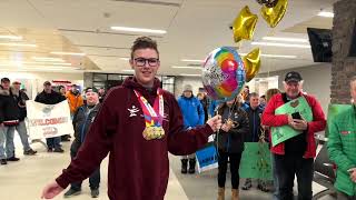 A champion’s welcome home for Labrador athlete Colin Rumbolt