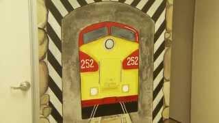 TRAIN THEMED WALL MURALS FOR KIDS: wall-to-wall train murals that include tracks painted on floors!