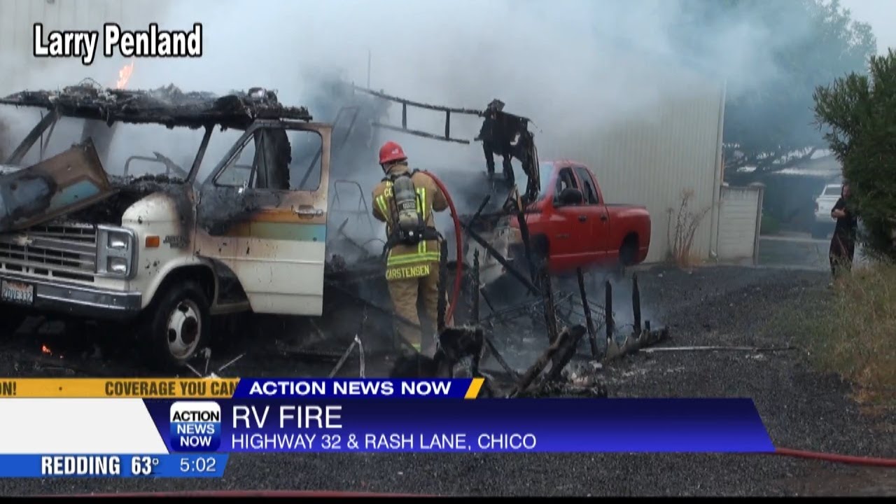 Fire crews knockdown moving truck trailer and RV fire