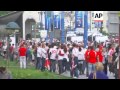 Russian and polish hooligans clash as fans march to stadium