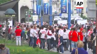 RUSSIAN AND POLISH HOOLIGANS CLASH AS FANS MARCH TO STADIUM