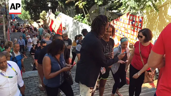 Catchings, Charles Play Tourists Climbing Rio's Se...