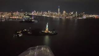 Night Flight Around Statue of Liberty