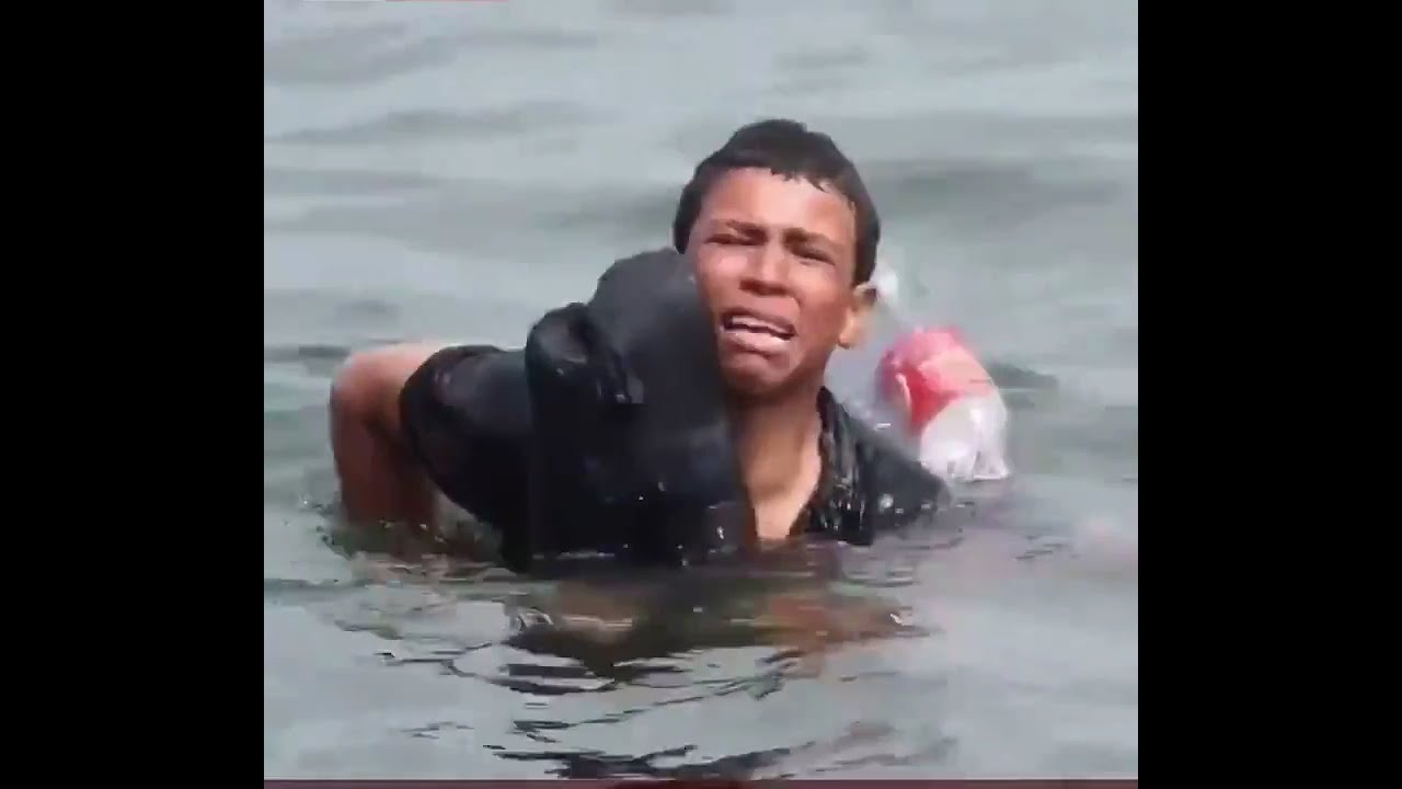 🇪🇸Migrant Boy Desperately Swims To Spain’s Ceuta With Plastic Bottles To Stay Afloat