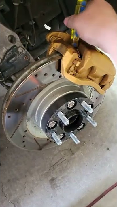How to remove or install wheel spacers with a screwdriver