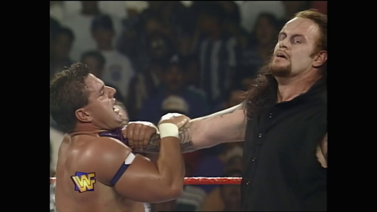 The Undertaker vs British Bulldog. Mankind interferes again & Undertaker gets counted out! (WWF) - YouTube
