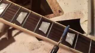 fingerboard binding trimming