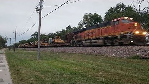 BNSF 8197 leading a work/maintenance train on flats (THE GREAT PUMPKIN BANDIT)