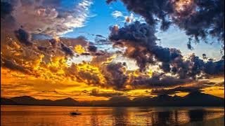 Music instrumen santai: Pemandangan laut saat matahari terbenam