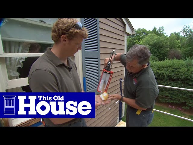 Solidifying rotting wood in a log cabin with Epoxy.