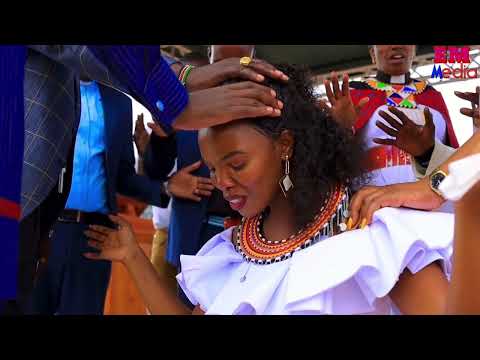 NELLY NAITENGEL RECEIVING BLESSINGS FROM GOD DURING HER ALBUM LAUNCH