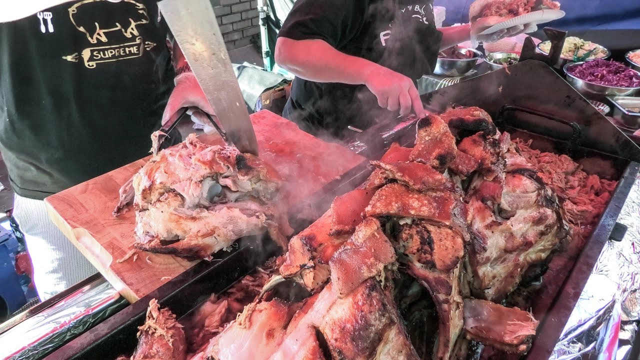 London Street Food at Tower Bridge Market. Tons of Meat and Sausages on Fire. World Food London Street Food at Tower Bridge Market. Tons of Meat and Sausages on Fire. World Food