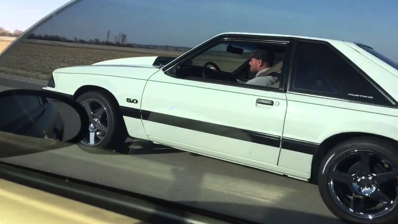 92 Foxbody vs 03 mustang gt w/ Kenne bell supercharger roll race at