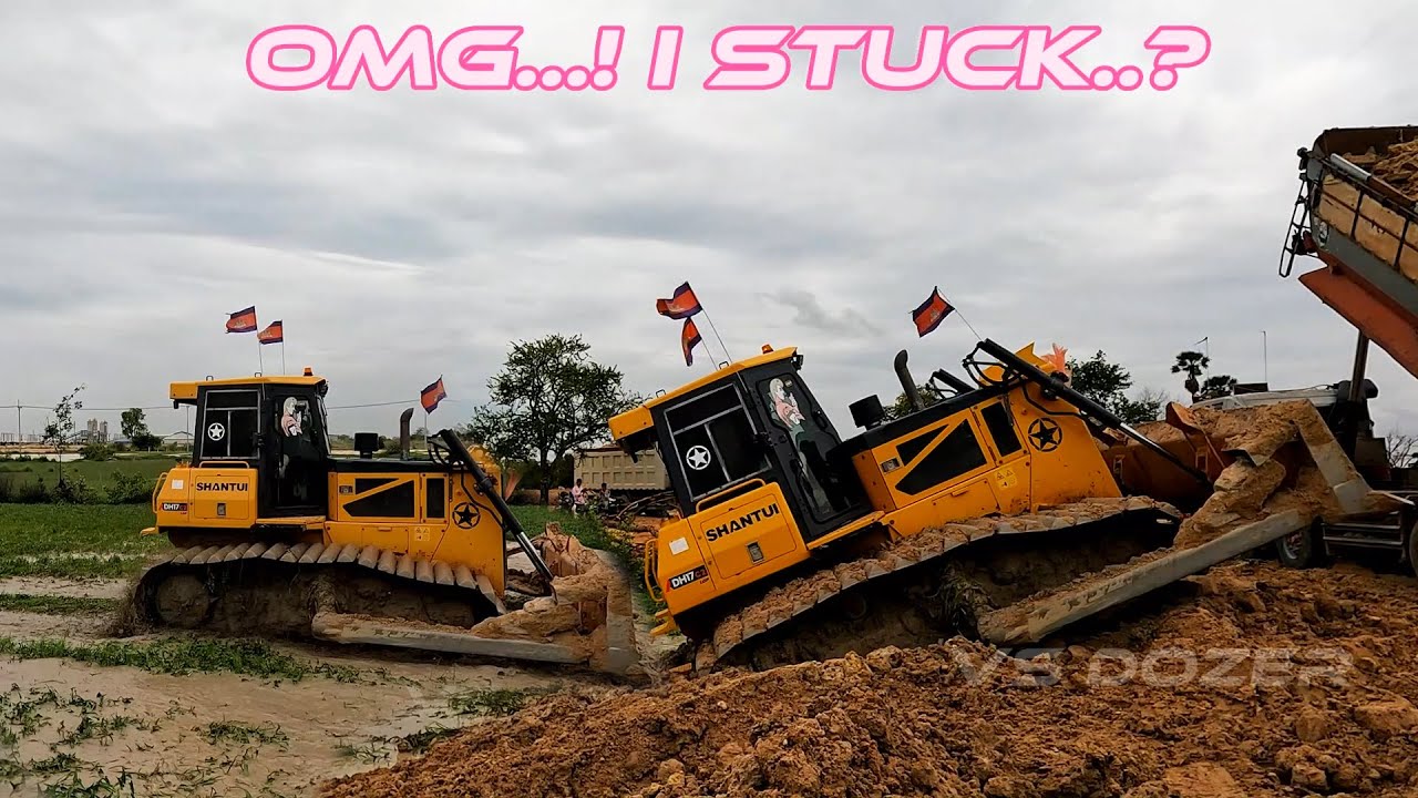 Dozer SHANTUI Playing Water At Landfill In To Pond By Dumptruck