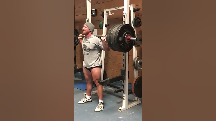 700lbs Squat. No belt or sleeves.