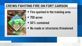 Crews fighting a fire on Fort Carson training area