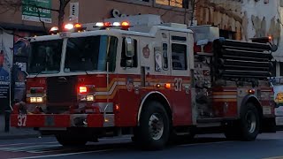 FDNY Engine 37 Responding On West 125th Street In West Harlem, Manhattan, New York.