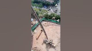 crane lifting excavator on the top of 20 storied building #shorts #truck #cranes