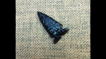 186 - Flint knapping a slab of translucent obsidian using only pressure. 1/1