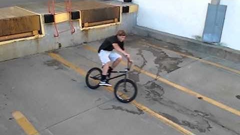 SLO-MO! Bmx 360 off a loading dock!