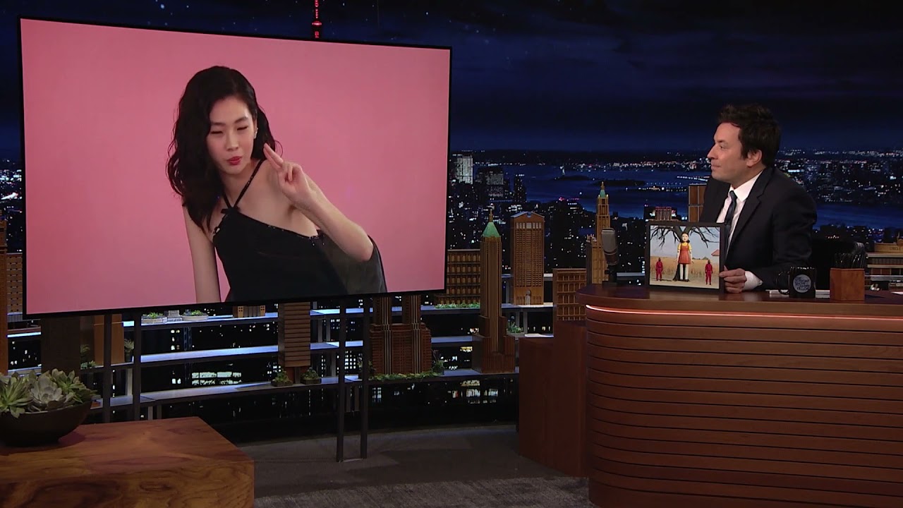 HoYeon Jung Speaking English - Explaining The Red Light, Green Light Doll.