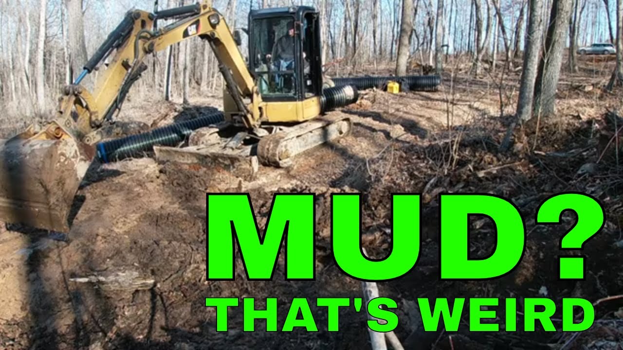 Homeowner installing culverts with Caterpillar 304 mini excavator YouTube