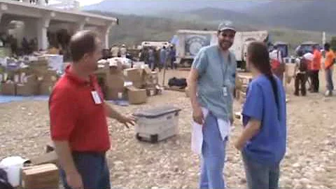 Paul and Sheryl Branson, and Dr. Chris outside the Good Samaritan Hospital at Jimani